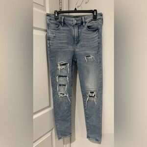 2/$20 American Eagle Distressed next level stretch woman’s blue Jeans size 10